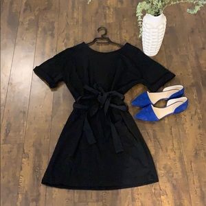 Cute black open back dress from Zara!